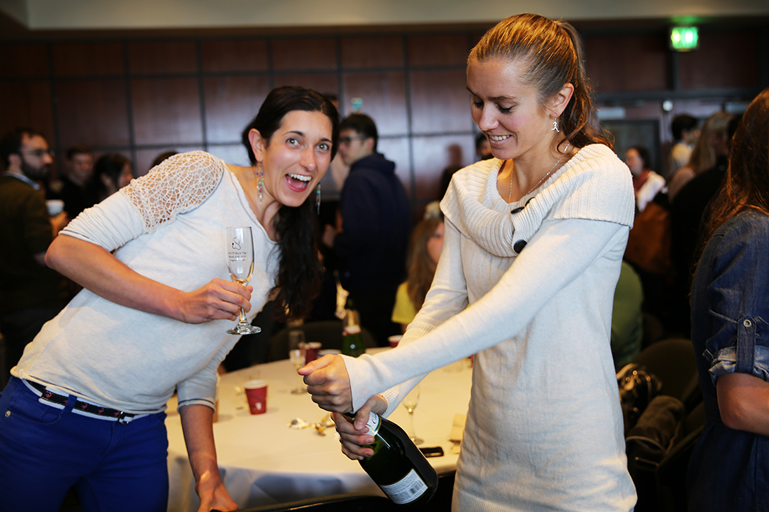 Fourth-year medical students Theresa Anne Poulos (left) and Michelle Meyer celebrate their acceptance into medical residency programs