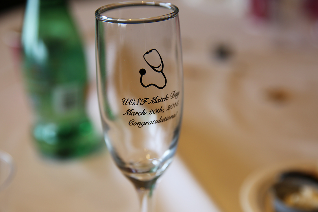 Commemorative UCSF Match Day glass with words "UCSF Match Day March 20-th, 2015 Congratulations!" on it.