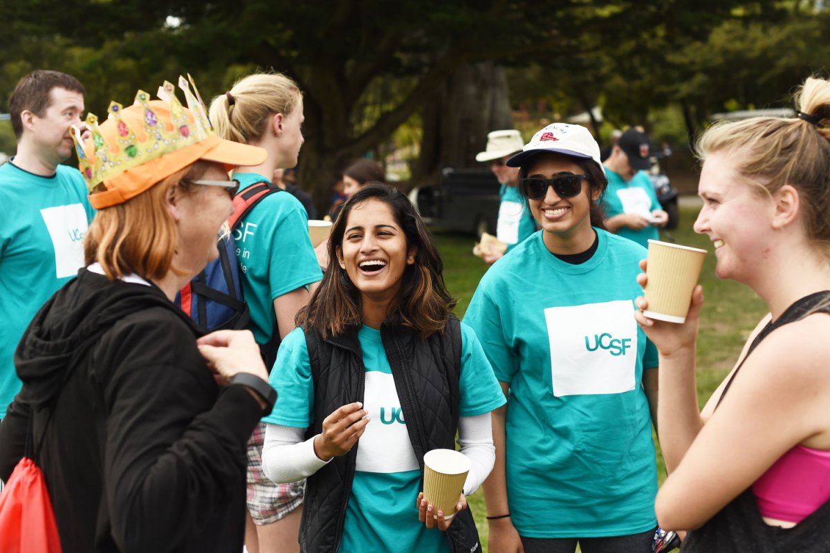 UCSF walkers mingle at Sharon Meadow in Golden Gate Park before AIDS Walk 2015 begins.
