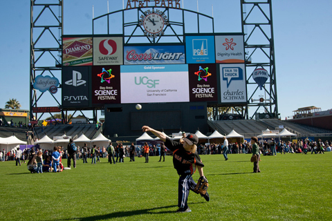 Keane Easterly, 10, practices his baseball pitching on the field at AT&T Park.