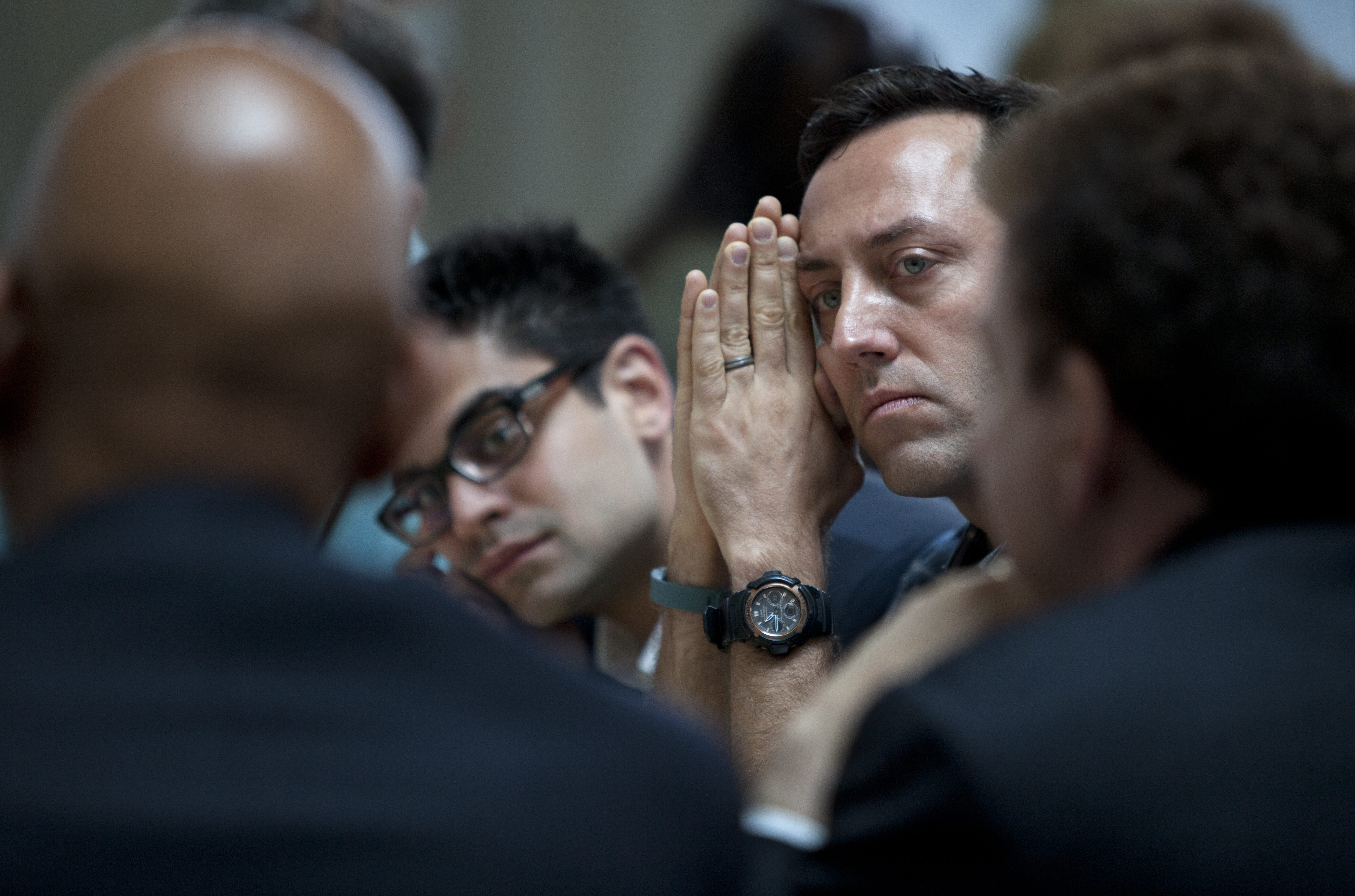 Tim Roberts, vice president of the digital experience at Fitbit, listens intently to ideas from experts who teamed up to discuss how to move precision medicine forward.