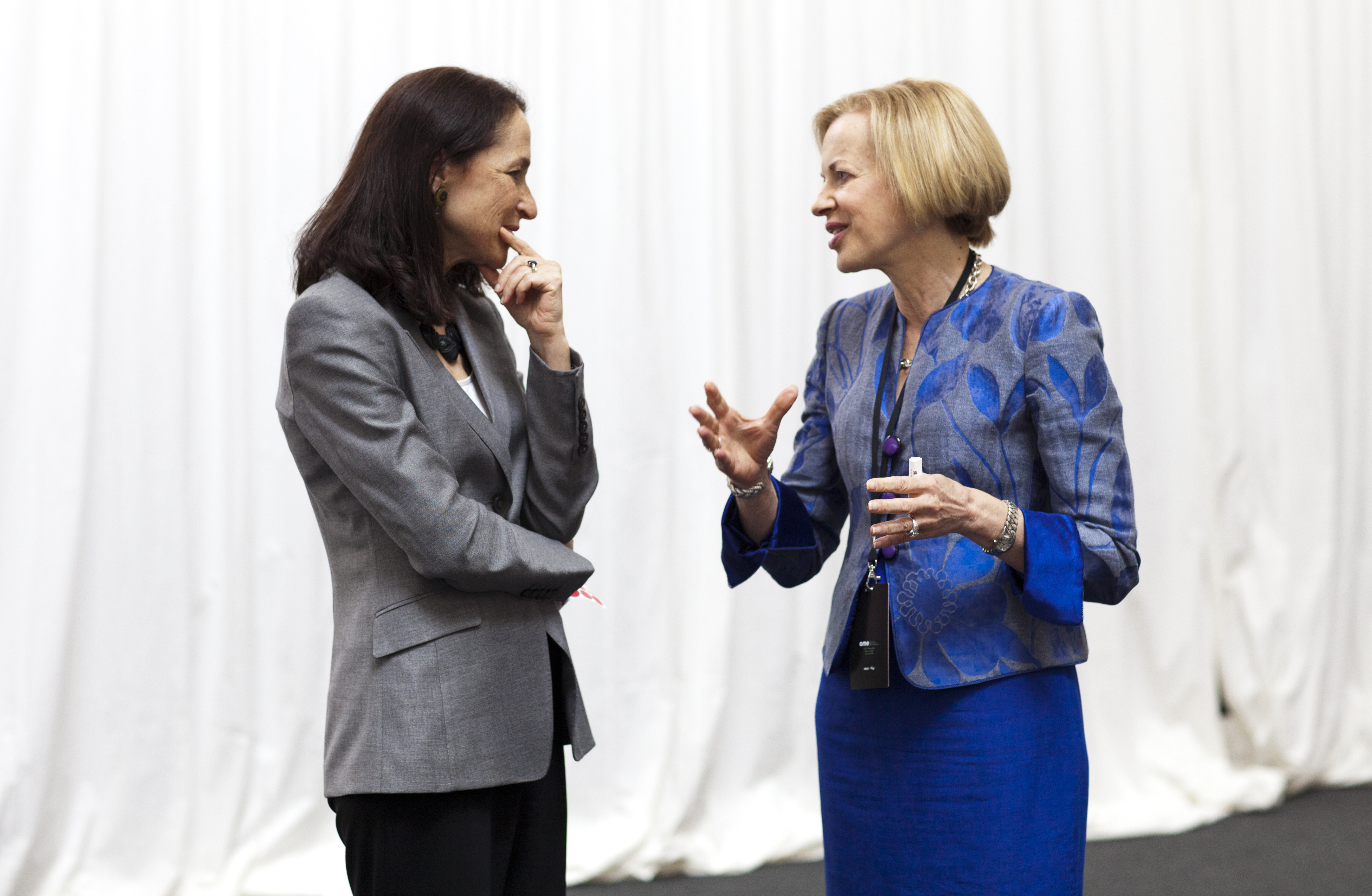 Margaret Hamburg, left, commissioner of the Food and Drug Administration, talks with another participant about the role of regulators in health care.