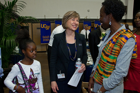 Winifred Kwofie, MBA, MS, associate director of Engineering Services in Facilities Management, chats with Chancellor Susan Desmond-Hellmann after receiving the Chancellor's Award for Public Service