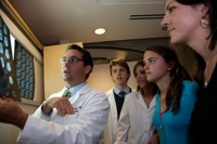 Doctor instructing students Doctor instructing students