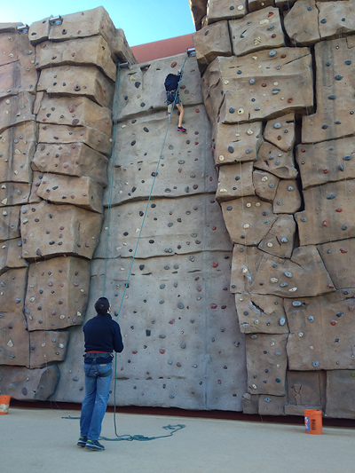 Amputee athlete Kristen Lusk, 14, scales up a 45-foot rock wall