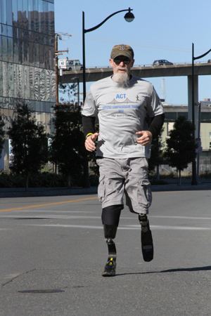 Vietnam War veteran Tim Woodville goes for a brisk run at UCSF Mission Bay.