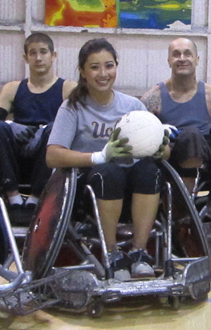 Angelica Galang, left, and her teammates with the United States Quad Rugby Assoc