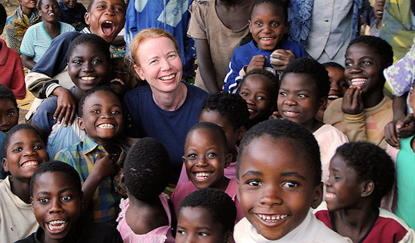Susan Kools with children in Malawai, Africa