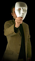 Photo of man holding mask