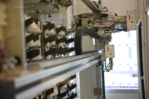 Robotic pill picker and plastic bags for medications.