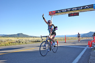 Heidi Dohse finishes a 206-mile bike race.