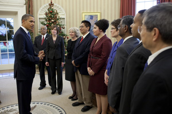 President Obama greets the recipients in the Oval Office