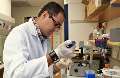 Michael Page, PhD, works in the lab. 