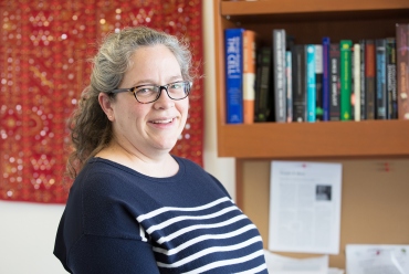 Sophie Dumont, PhD, stand in her office at UCSF