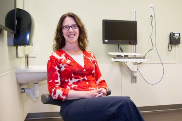 Vanessa Jacoby sits in an exam room