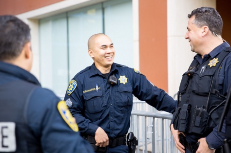 3 UCSF police officers chatting with each other