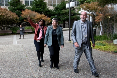 UC President Janet Napolitano, center, takes a walking tour of the Parnassus campus