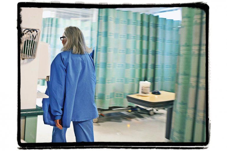 Nancy Ascher walks through the hospital.