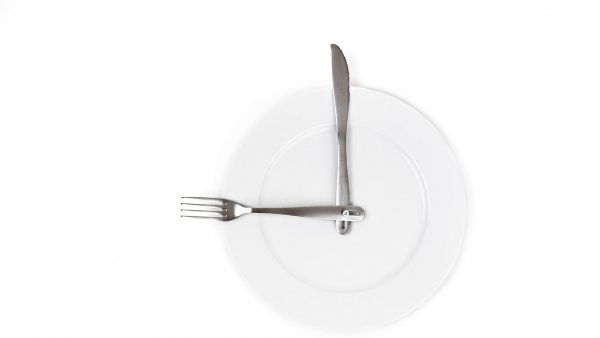 plate with fork and knife to make look like a clock