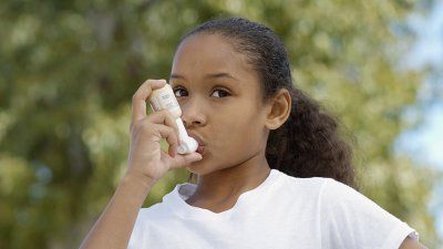 young-girl-asthma-inhaler.jpg