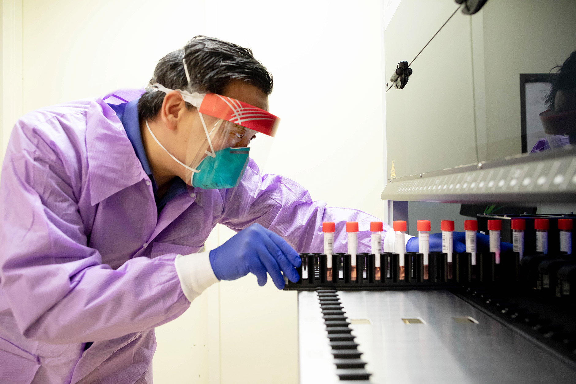 Charles Chiu works with samples in his in laboratory