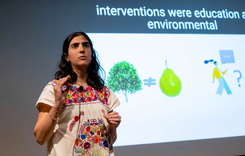 Third place winner Lucia Abascal Miguel, Global Health Sciences, delivered her research “No le Pidas peers al Olmo/Don’t ask the Elm Tree for Pears,”