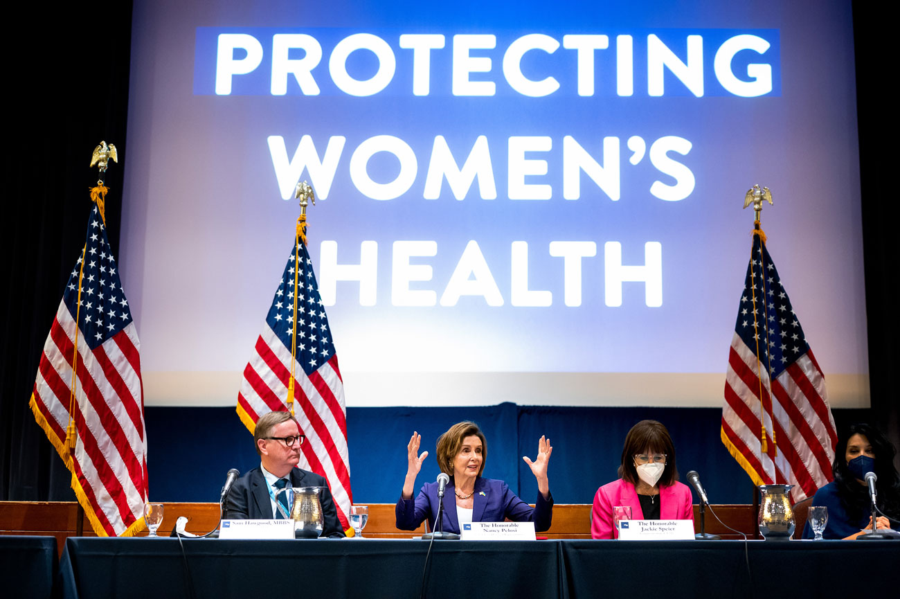 UCSF Chancellor Sam Hawgood, Pelosi, Congresswoman Jackie Speier and Planned Parenthood Northern California Executive Director Gilda Gonzales.  On a screen it reads 