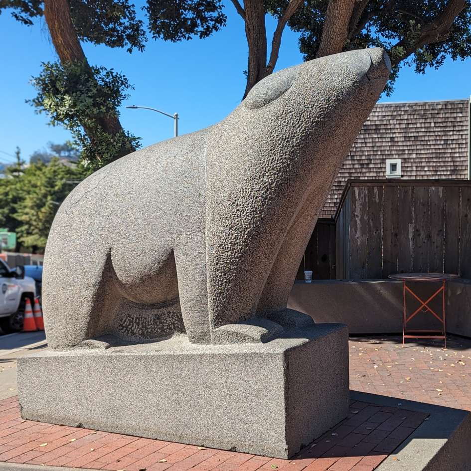 statue on the street of a single bear