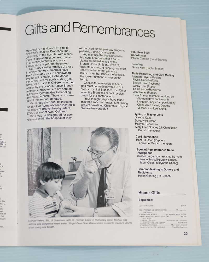 A page of the 1982 edition of Bambino Baby magazine, featuring a greyscale photo of three-year-old Michael Valero with his pediatrician Herman Lipow, MD.