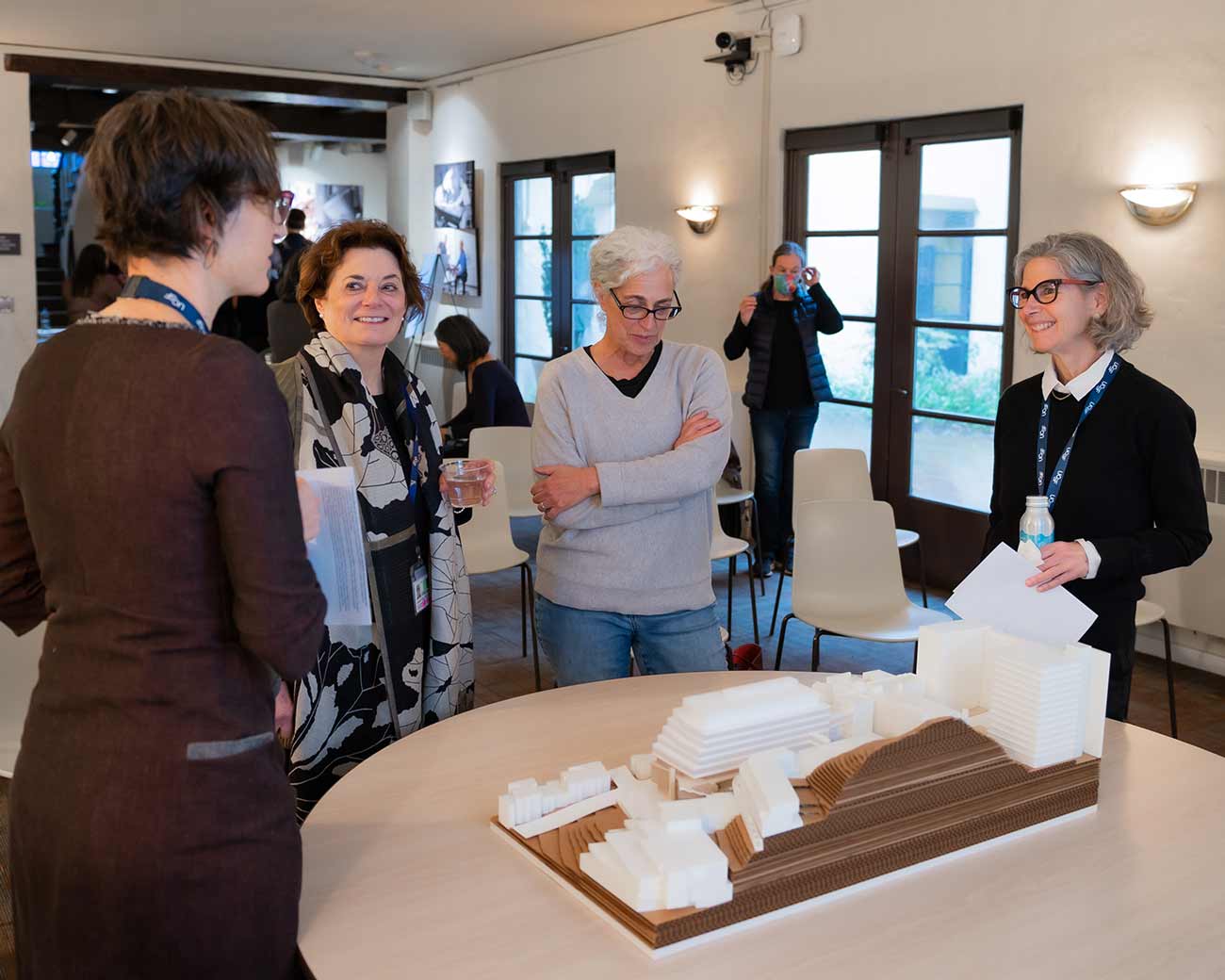 U C  S F staff explain an architectural model to members of the Parnassus Heights community.