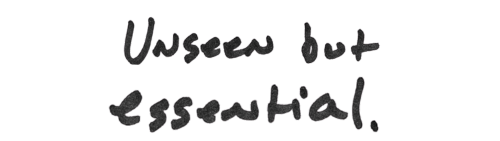 Notecard says “Unseen but essential.”