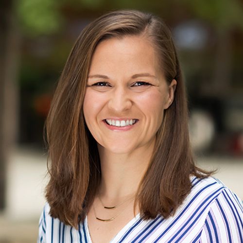 Leah McIntyre, DPT, smiling outdoors.