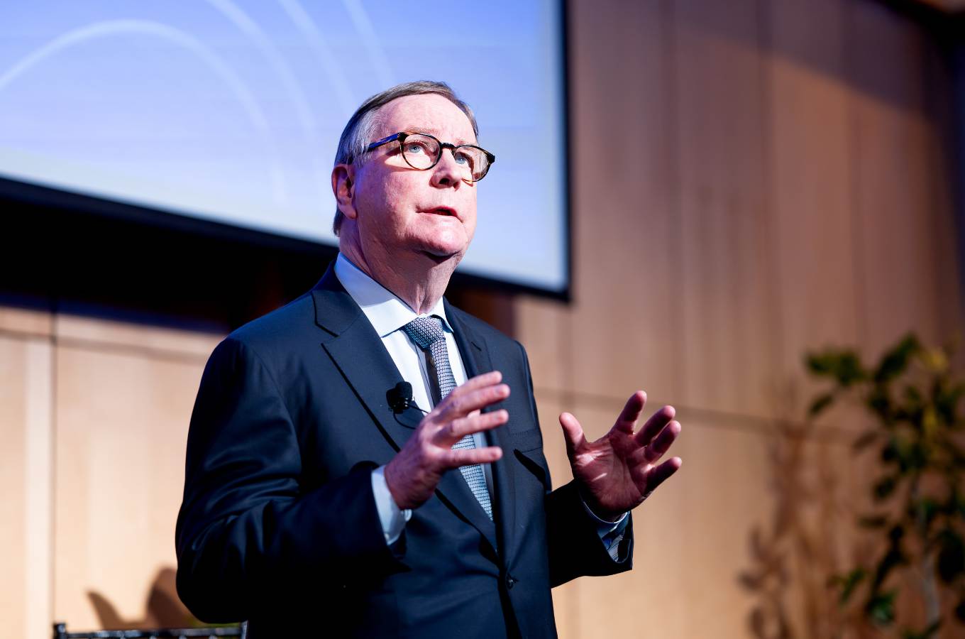 Chancellor Hawgood speaks with his hands to reinforce his ideas.