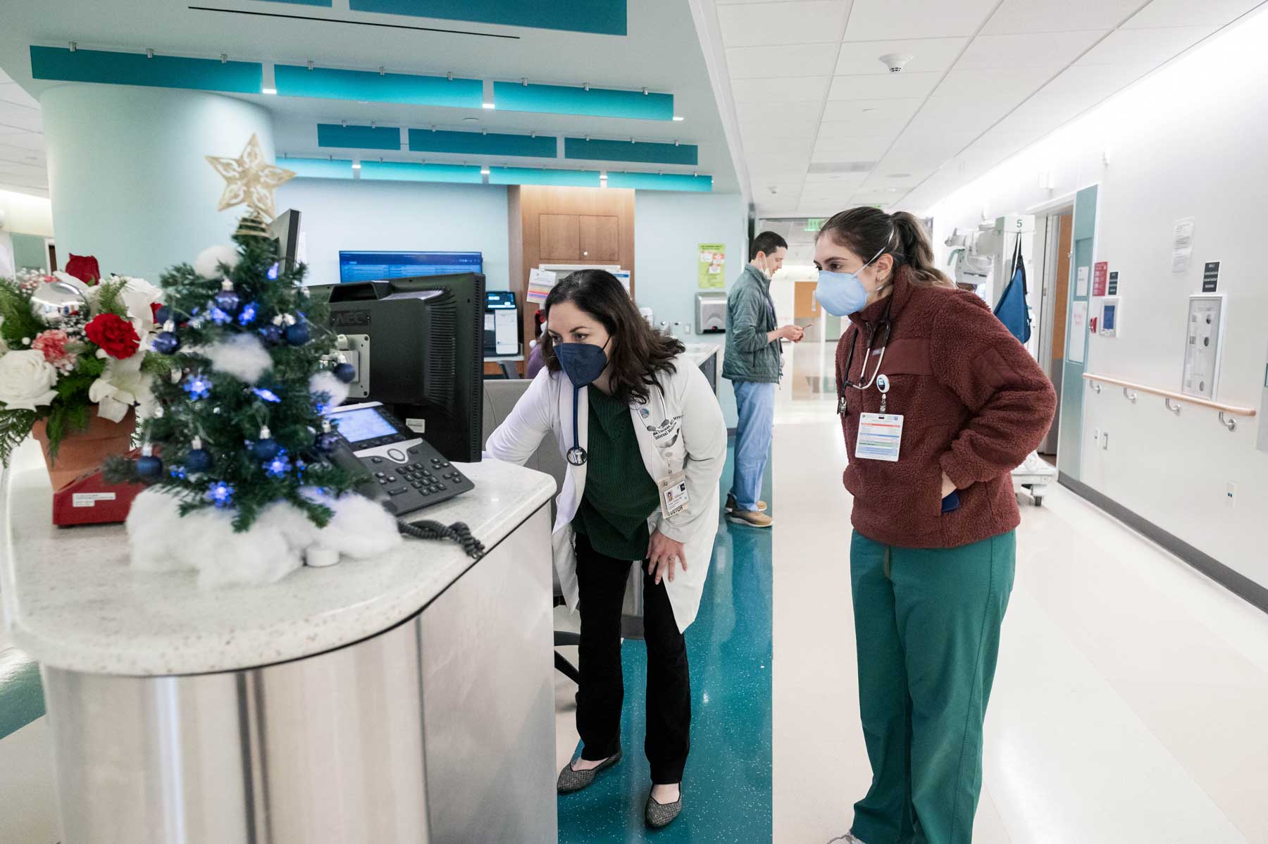Larissa Thomas makes rounds with a resident at Zuckerberg San Francisco General Hospital.
