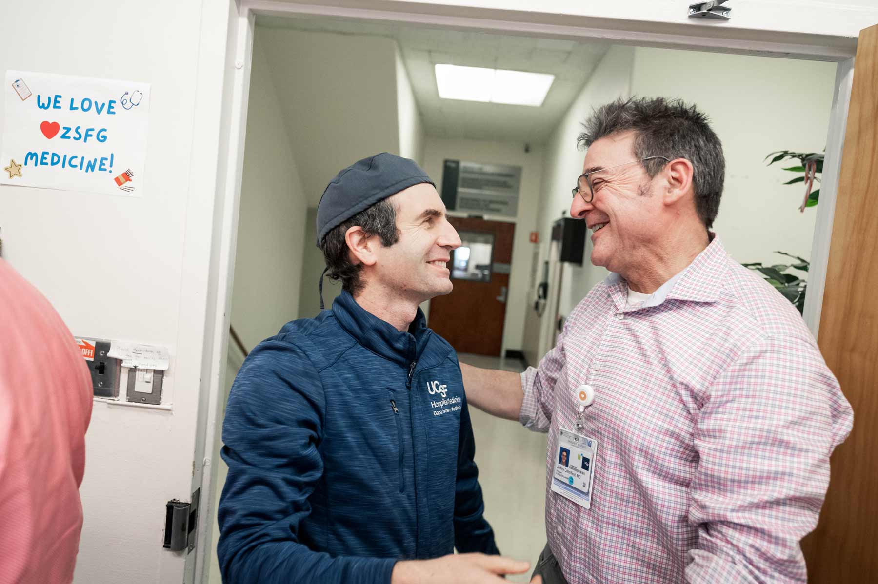 Hospitalists Ari Johnson and Jeffrey Critchfield exchange a smile.