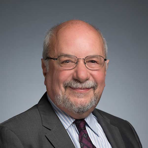 Headshot of Dennis Black.