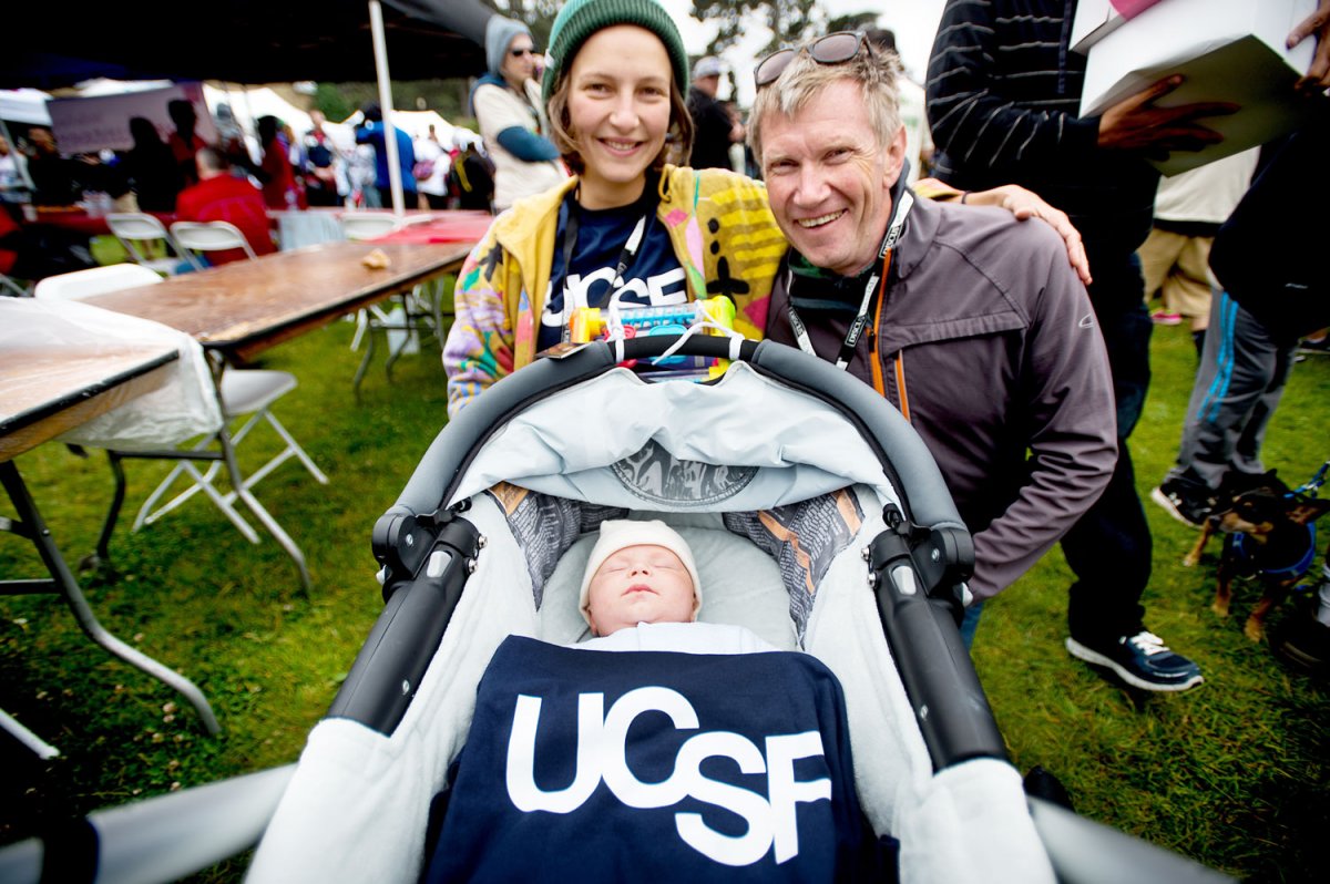Lev Brouk and Elena Kuleshina brought one of the youngest participants in UCSF's AIDS Walk contingent - their son, Fedor Brouk, who napped before the walk started.