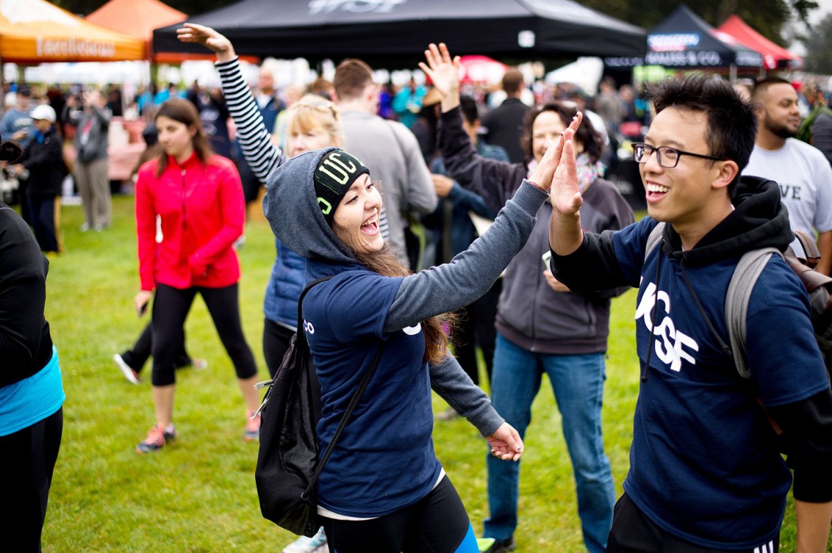 UCSF team members participate in the AIDS Walk morning warm-up session.