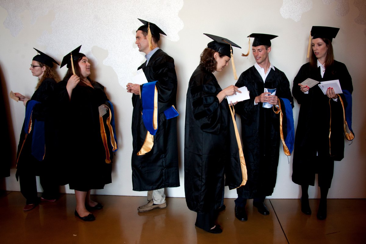 Graduate students line up for the procession into Robertson Auditorium for the commencement ceremony at UCSF Mission Bay on May 16. 