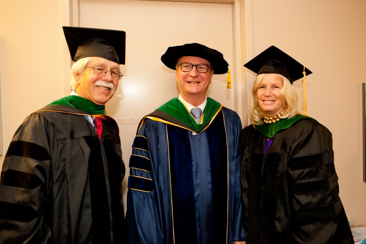 Sam Hawgood, center, dean of the UCSF School of Medicine, stands with Homer Boushey, a UCSF professor of medicine, and Susan Blumenthal, former U.S. Assistant Surgeon General who is now a clinical professor at Georgetown and Tufts University Schools of Medicine. She delivered the commencement speech.
