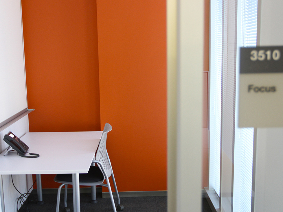 Rows of “focus rooms” line the internal walls surrounding each department. The walls block any office sounds, and phone calls taken at one’s desk can easily be forwarded to these private rooms.