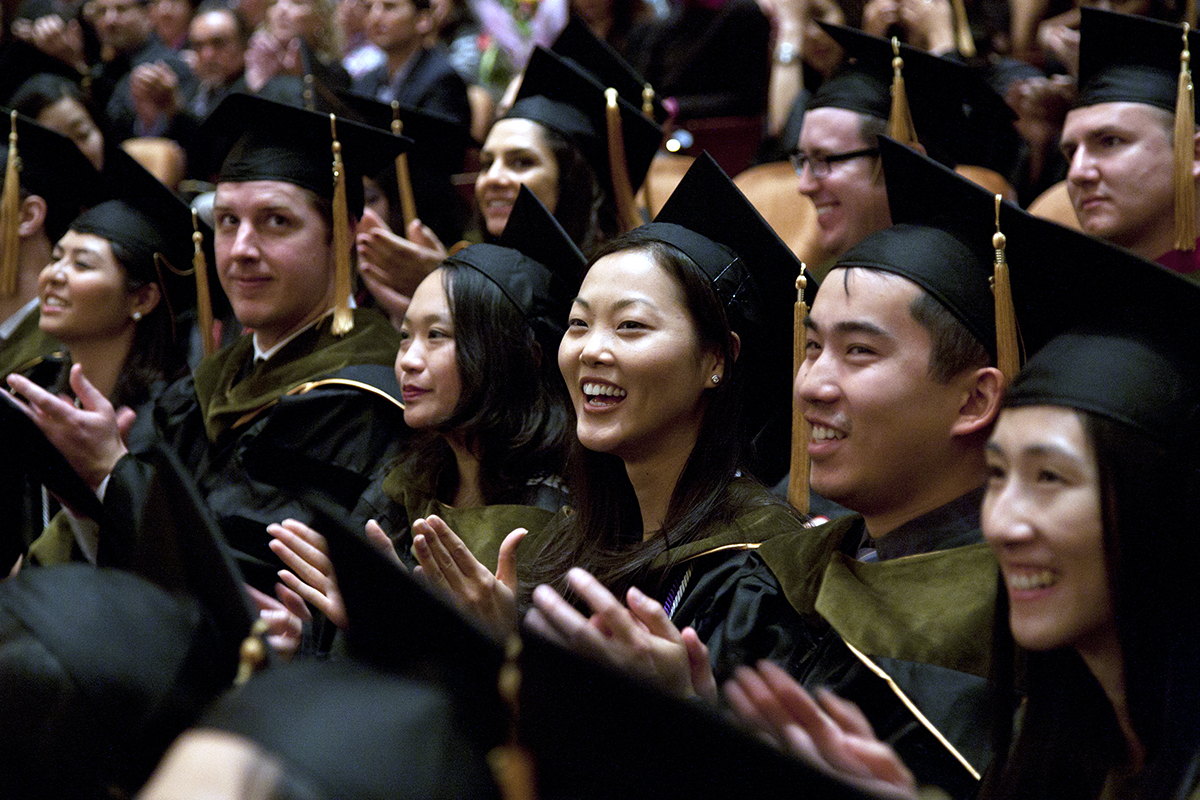 UCSF School of Pharmacy graduates applaud during their commencement ceremony at Davies Symphony Hall.