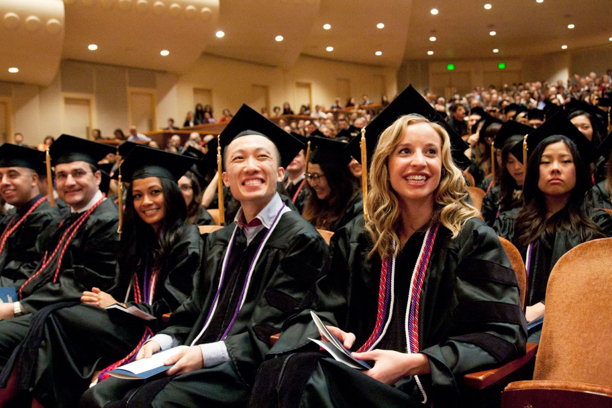 School of Pharmacy graduates settle in during their commencement ceremony at Davies Symphony Hall. 