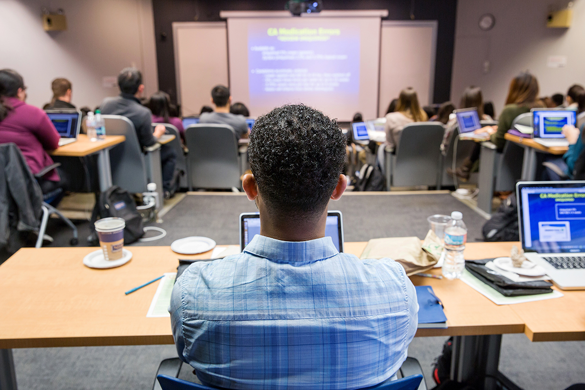 A month before graduating, Henock Woldu attends his Pharmacy Board Review Class.