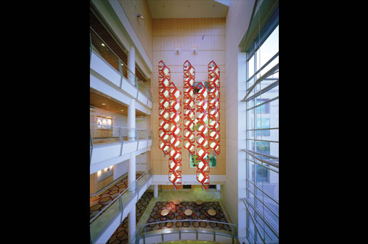 a five-pendant chandelier by Jim Isermann