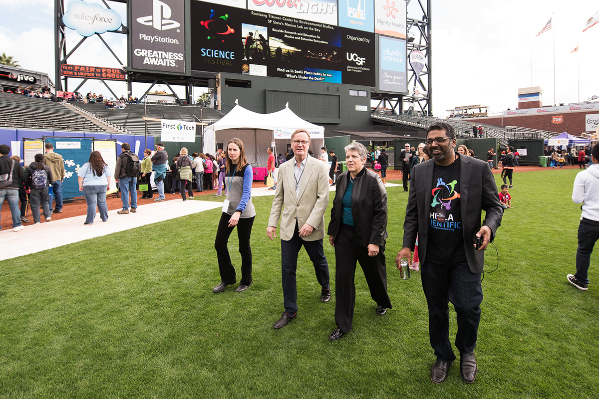 Rebecca Smith, co-director of SEP, Chancellor Sam Hawgood, University of California President Janet Napolitano, and Bay Area Science Festival Director Kishore Hari check out the science interactives and exhibits.