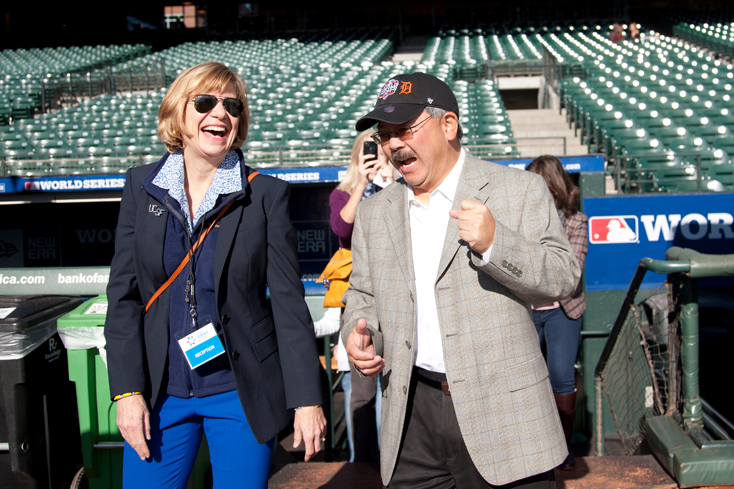 Chancellor Susan Desmond-Hellmann, MD, MPH, and San Franicsco Mayor Ed Lee share a laugh while touring Discovery Day at AT&T Park