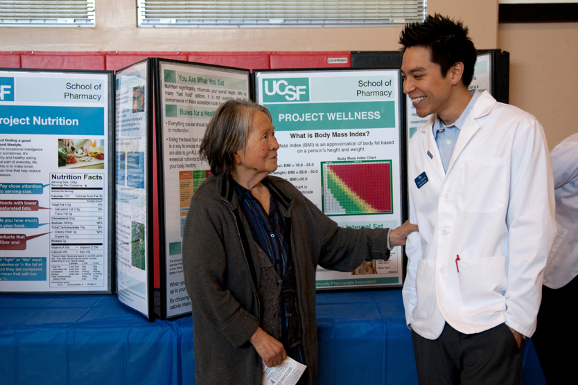 Pharmacy student Paul Albicker enjoys a conversation with Linda Wong