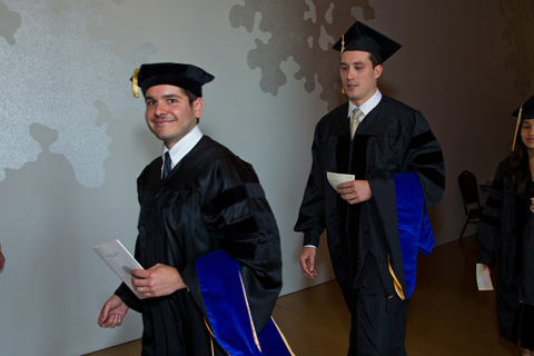 Graduates in gowns.