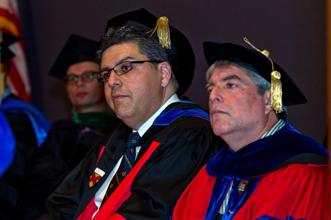 Joseph Castro, vice chancellor for Student Academic Affairs, and Jeffrey Bluestone, executive vice chancellor and provost, listen to the commencement speeches.